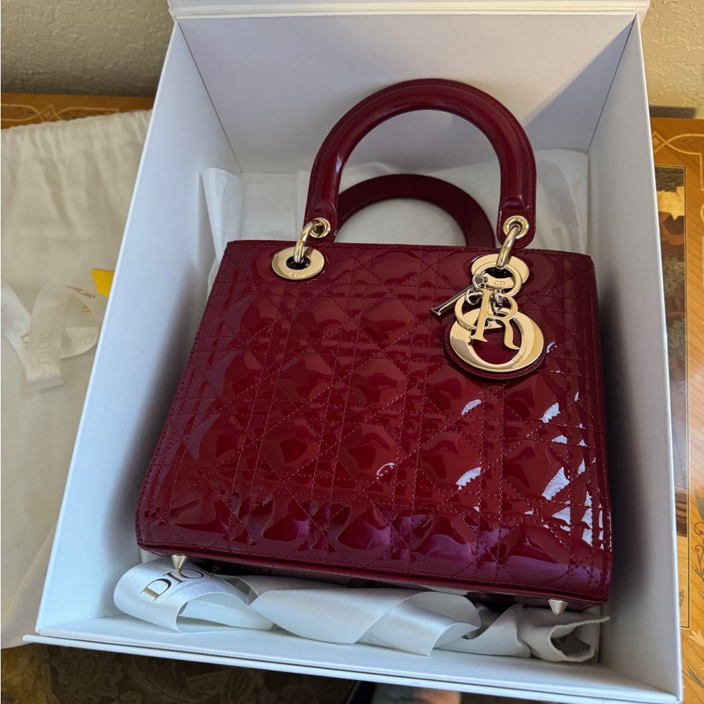 Medium Lady Dior Bag, Cherry Red patent calfskin leather.
